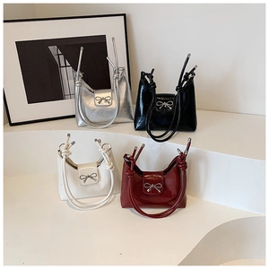 Stylish patent leather bucket bag with metallic bow, four colors on display