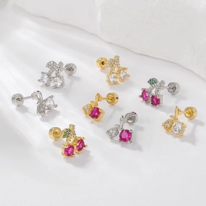 Macro view of crystal cherry stud earrings with screw-back and colorful zircon stones