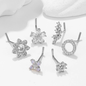 Set of 6 stainless steel L-shaped nose studs with sunflowers and purple opal cross designs