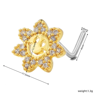 L-shaped gold nose stud with sunflower zircon inlay and smiley face center detail