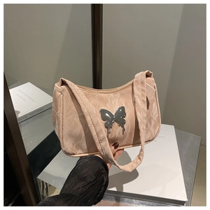 Pink marble texture underarm bag with a silver butterfly buckle in a Y2K aesthetic