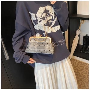 Retro grey plaid and polka dot shell bag detail with gold chain and metal handle