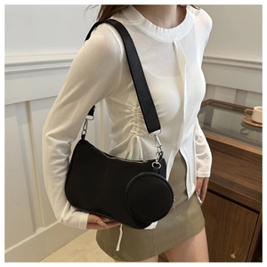 Minimalist black nylon underarm bag with detachable round coin purse and wide strap