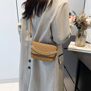 Chic brown monogram crossbody bag with golden chain strap and adjustable leather handle
