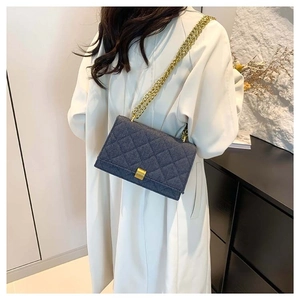 Fashionable dark grey quilted chain crossbody bag for women with minimalist retro style