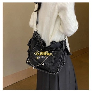 Retro washed denim crossbody bag with yellow embroidery and pearl chain detail
