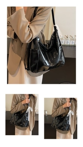 Detail of glossy black leather tote bag with elegant white lace bow decoration