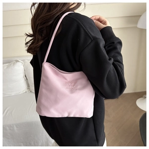 Pink nylon tote bag with embroidery, chic underarm style and soft aesthetic shoulder strap