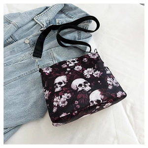 Gothic shoulder bag with skull and purple floral print on black vintage bucket bag