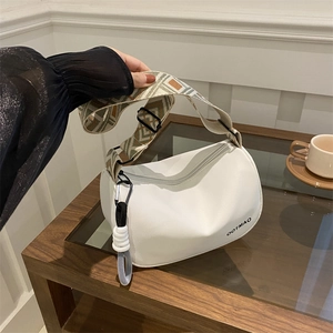 Minimalist white nylon Boston bag with ethnic geometric wide strap and drawstring detail
