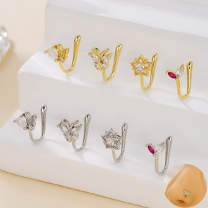 U-shaped non-piercing nose rings set with butterfly and star patterns in gold and silver