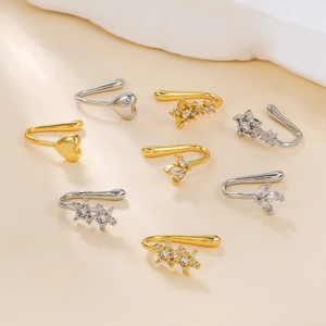 Gold and silver heart and star shaped brass ear cuffs with sparkling zircon stones