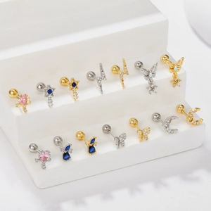 Chic gold and silver star fairy wand earrings set with colorful cubic zirconia studs