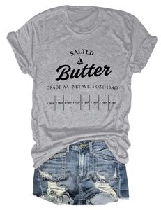 Detail of Salted Butter graphic print on grey cotton t-shirt with denim shorts