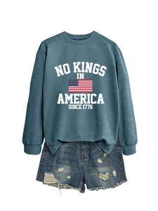 Close-up of No Kings In America crewneck sweatshirt with vintage American flag print