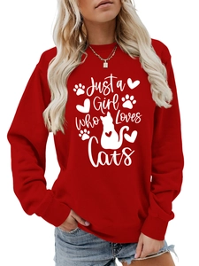 Detail of red crewneck sweatshirt featuring Just a Girl Who Loves Cats white silk printing