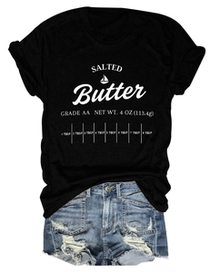 Detail of black crewneck T-shirt with salted butter print and ripped denim shorts set
