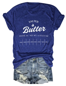 Flat lay detail of Salted Butter printed t-shirt with distressed denim shorts
