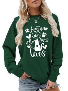 Detail of forest green sweatshirt with white Just a Girl Who Loves Cats graphic print