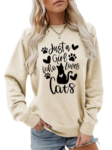 Detail of Just a Girl Who Loves Cats graphic print on beige crewneck sweatshirt