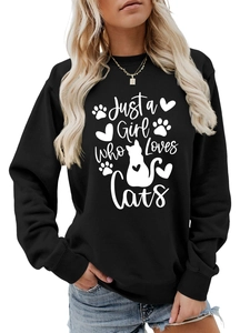 Close-up of ribbed neckline and Just a Girl Who Loves Cats print on black sweatshirt