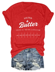 Detail of red Salted Butter cotton t-shirt paired with distressed denim shorts
