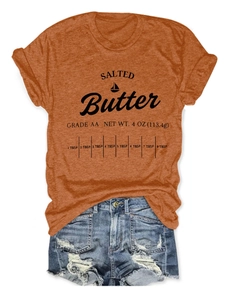 Detail of creative Salted Butter print on caramel round neck short sleeve t-shirt
