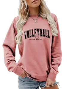 Detailed close-up of the volleyball mama print on a pink crewneck sweatshirt for women