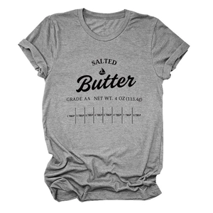 Close-up of grey T-shirt featuring salted butter packaging design and rolled sleeves