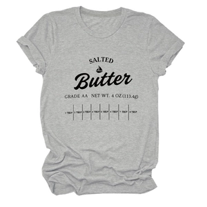 Detail of grey crewneck t-shirt featuring a salted butter wrapper graphic and rolled sleeves