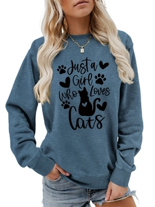 Detail of Just a Girl Who Loves Cats print on denim blue crewneck sweatshirt fabric