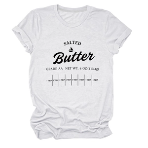 Close-up of white cotton T-shirt featuring retro Salted Butter graphic and cutting scale