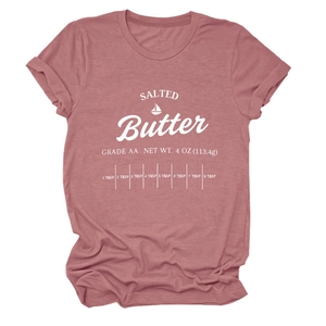 Close-up of salted butter print details on a pink short-sleeve casual cotton t-shirt