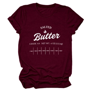 Detailed view of maroon t-shirt with salted butter label print and measurement scale