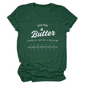 Close-up of salted butter print on dark green t-shirt with fine marled fabric texture
