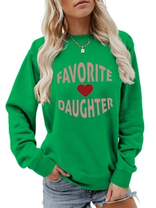 Close-up of bright green hoodie featuring pink Favorite Daughter print and red heart