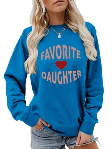 Detail view of Favorite Daughter blue sweatshirt with pink letters and red heart print