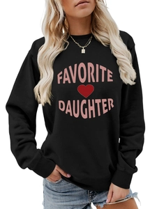 Close-up of pink Favorite Daughter text and red heart on black ribbed crewneck sweatshirt