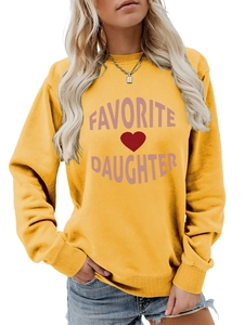 Detail of yellow round neck sweatshirt with pink Favorite Daughter text and red heart