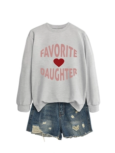 Flat lay of gray Favorite Daughter sweatshirt with pink letters and blue denim shorts