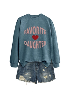 Detailed view of grey-blue crewneck sweatshirt with pink Favorite Daughter heart print