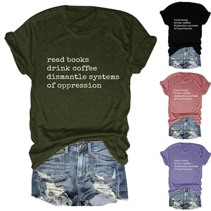 Close-up of crewneck t-shirt fabric texture with read books drink coffee printed slogan