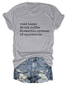 Detail of read books print on grey crew neck tee paired with ripped denim shorts