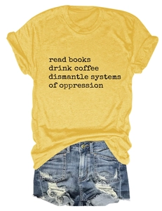 Detail of yellow T-shirt with text print paired with distressed blue denim shorts