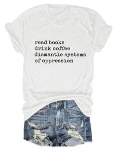 Detailed flat lay of a white cotton t-shirt with text and distressed blue denim shorts