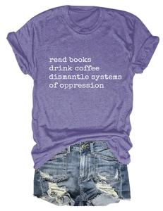 Detail of purple cotton T-shirt with white slogan and distressed denim shorts set