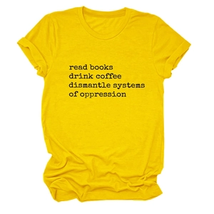 Detail of yellow cotton t-shirt featuring black typewriter text and crew neck design