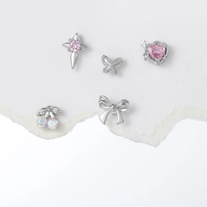Five-piece set of silver zircon stud earrings featuring heart, star, and butterfly designs
