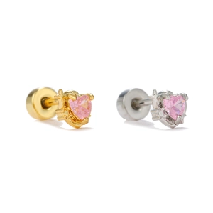 Macro detail of pink heart zirconia earrings with star reliefs and screw backs