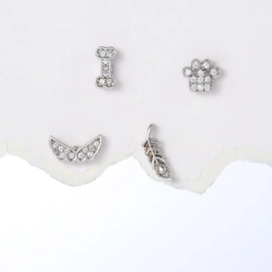 Sparkling silver ear studs set with zircon paw bone angel wing and feather motifs
